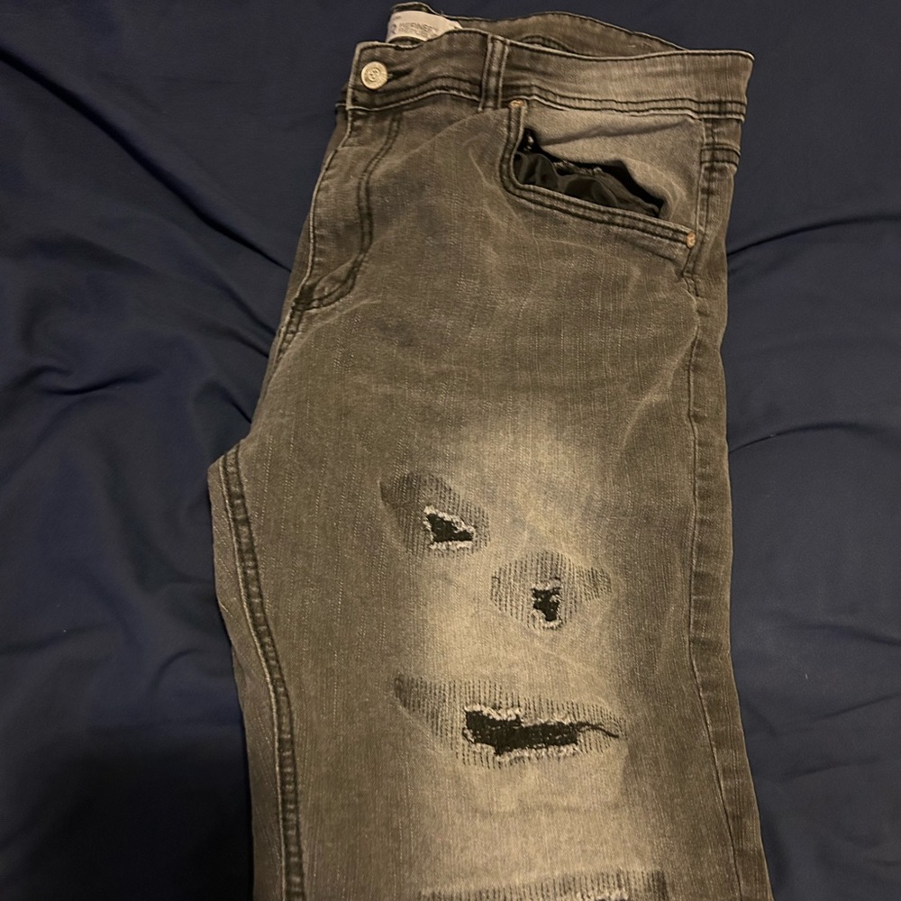 grayish black patch ripped jeans size 38/32